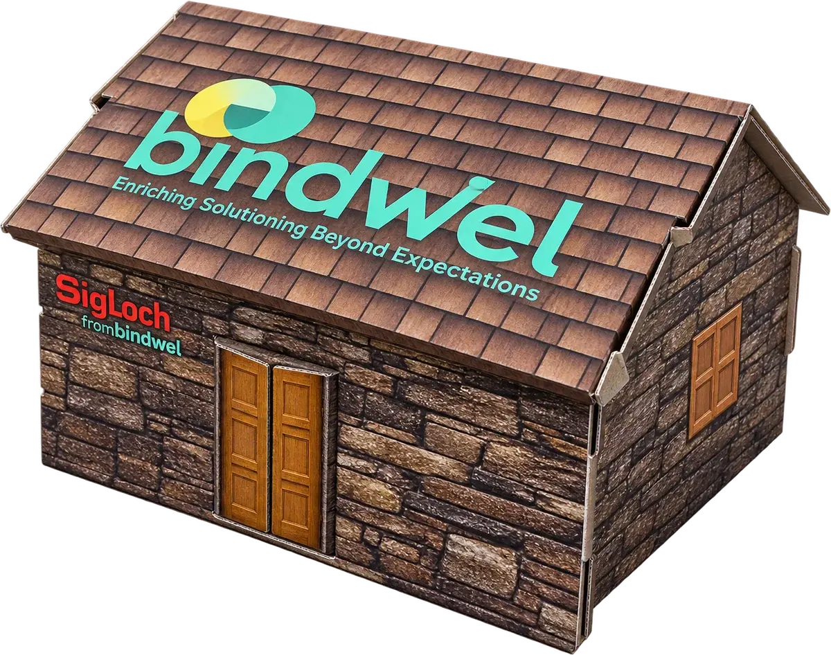Flat-pack stone cottage model, cut on a SigLoch XE-CUT
